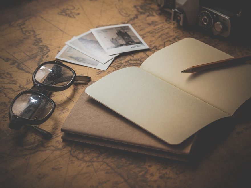 Glasses with notepad on a card